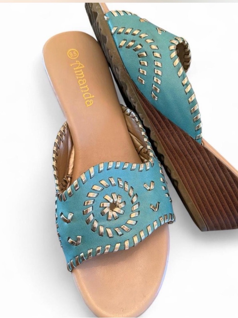 Women’s  size 9.5 Boho turquoise low wedge Amanda sandal with silver stitching.